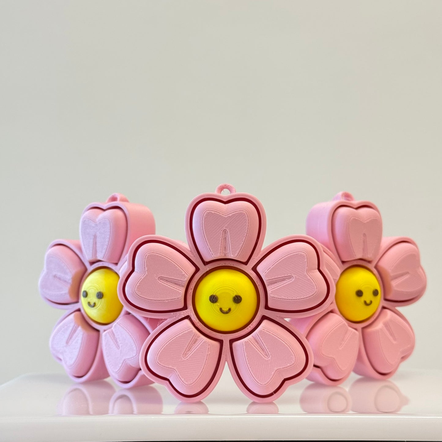 🌸 Smiley Sakura Bloom Clicker Keychain