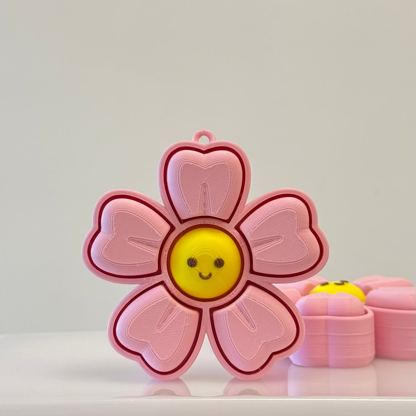 🌸 Smiley Sakura Bloom Clicker Keychain